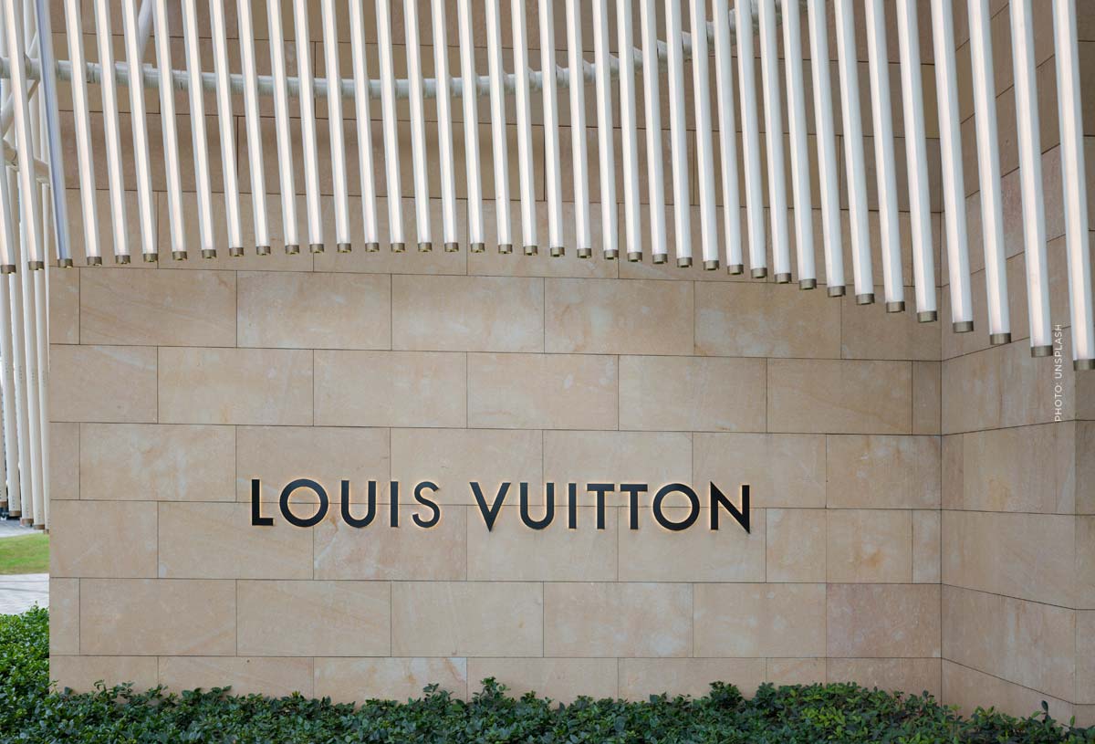 Louis Vuitton Men Fall-Winter 2024: Paris, Cowboys & Pharrell Williams louis-vuitton-store-logo-text-shopping